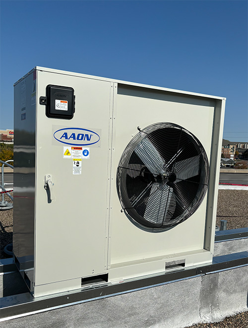 Commercial rooftop HVAC unit installed on a building by Spriggs Mechanical.
